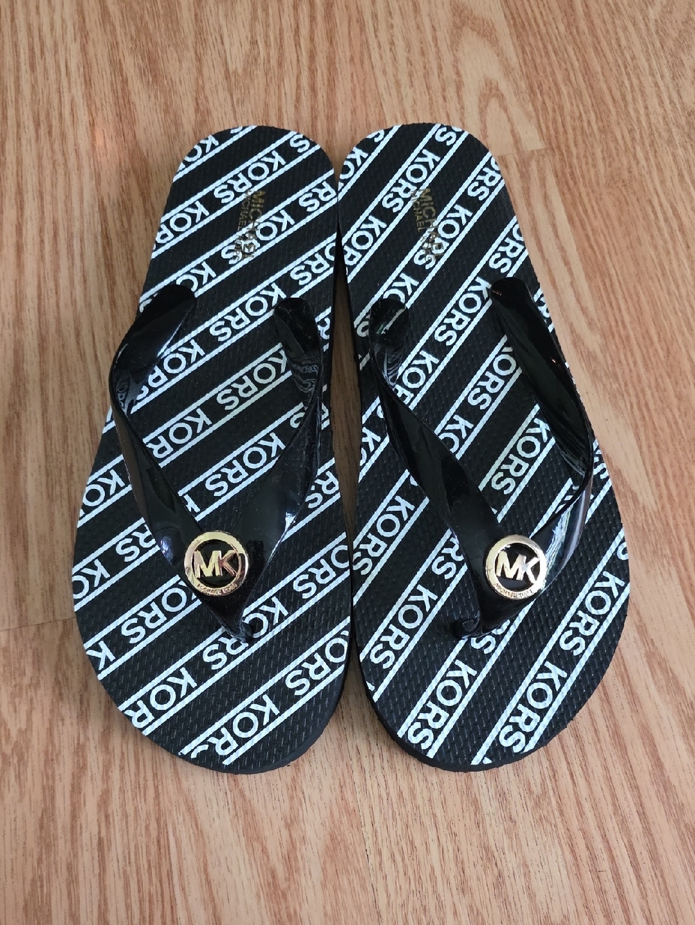 Michael Kors Black & White Logo Strap Flip Flops with Gold MK Medallions